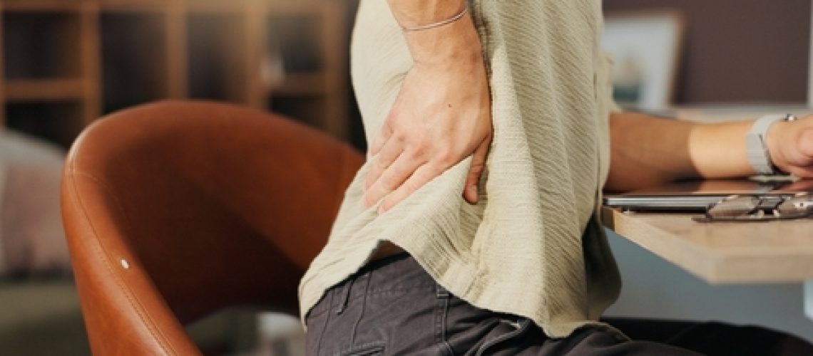 Back,Pain,,Injury,And,Person,At,Desk,With,Posture,Problem,
