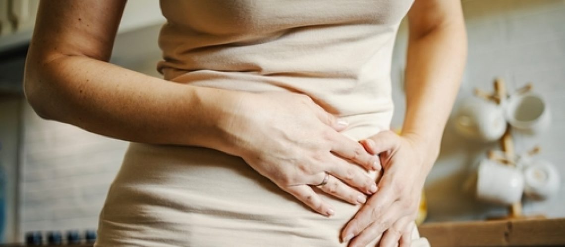 Woman,Feeling,Strong,Abdominal,Pain,,Experiencing,Discomfort,,Indigestion,,Or,Menstrual