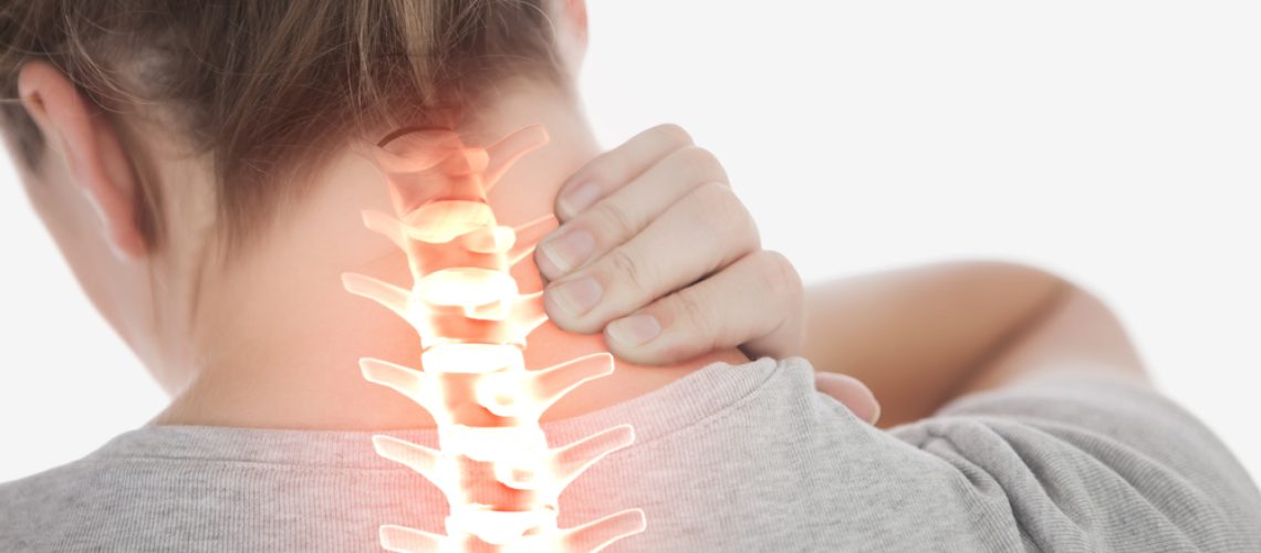 Digital,Composite,Of,Highlighted,Spine,Of,Woman,With,Neck,Pain